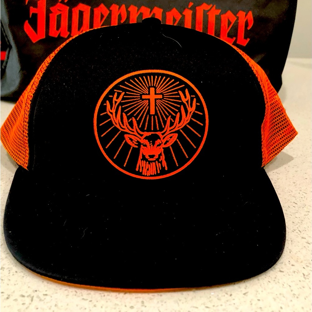 Black/orange Jäegermeister trucker hat.